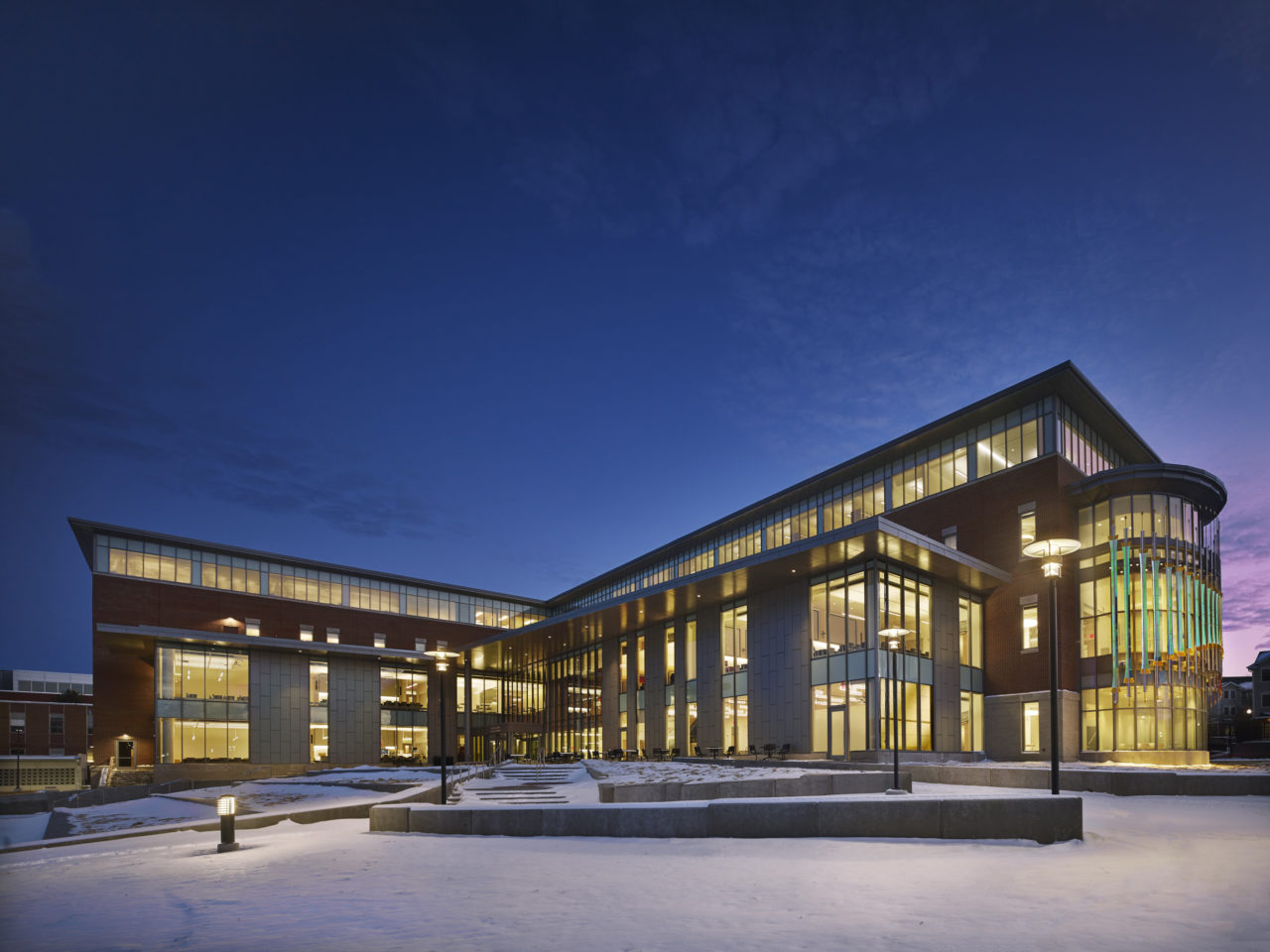 Rohrer College of Business at Rowan University exterior full view with Threshold laminated dichroic glass and perforated stainless steel sculpture at right. | Image 1 | Ed Carpenter, Artist