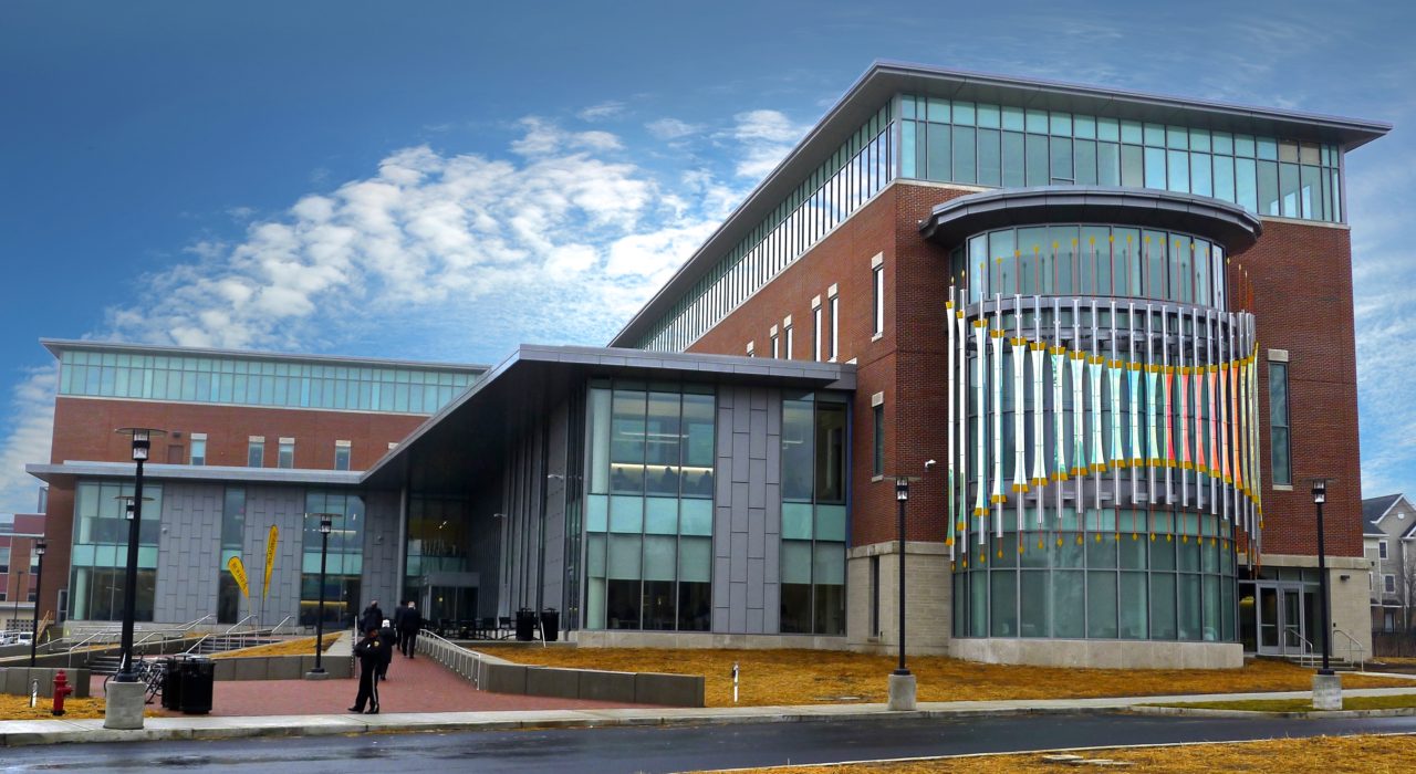 Rohrer College of Business at Rowan University exterior side view with Threshold laminated dichroic glass and perforated stainless steel sculpture at right. | Image 2 | Ed Carpenter, Artist