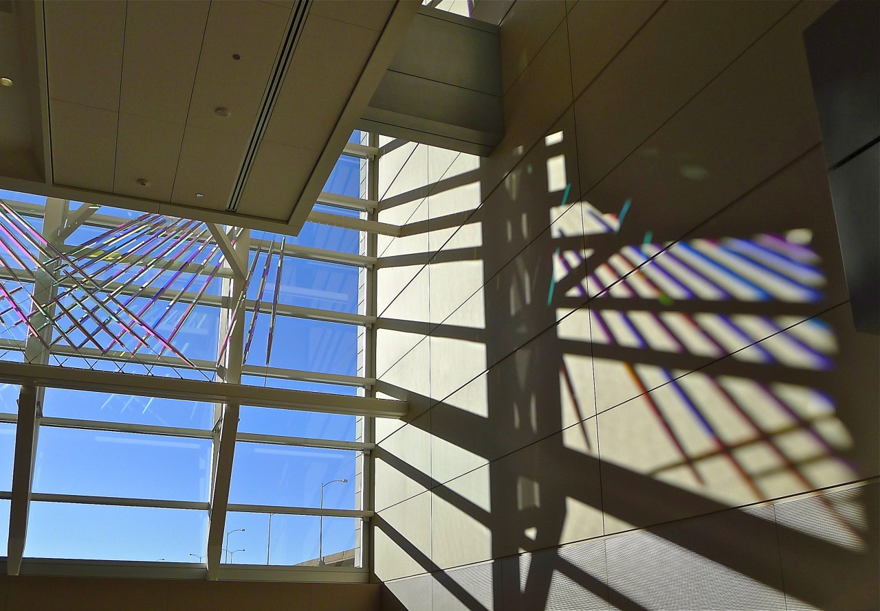 View of Ed Carpenter’s McCarran airport skylight art cable-mounted glass panels whose colors and reflections transform themselves dramatically from various angles. | Image 7 | Ed Carpenter, Artist