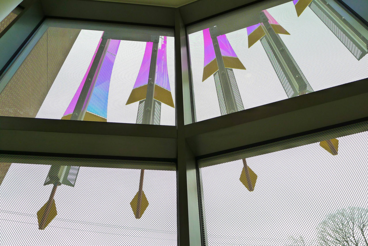 Rohrer College of Business at Rowan University interior view of laminated dichroic glass and stainless steel fin details. | Image 8 | Ed Carpenter, Artist